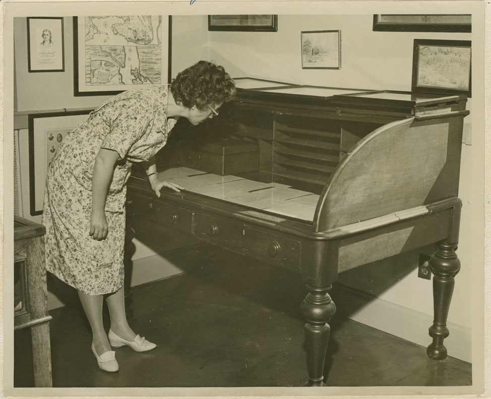photocollection : Places: Halifax, Halifax Co.: Buildings: Archives: Phyllis Blakeley looking at Joe Howes desk B-20, 2 copies