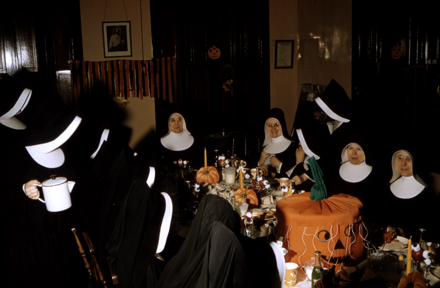 communityalbums - Sisters of Charity-Halifax at table decorated for Halloween supper, Saint Anne's Convent, Glace Bay, Nova Scotia.