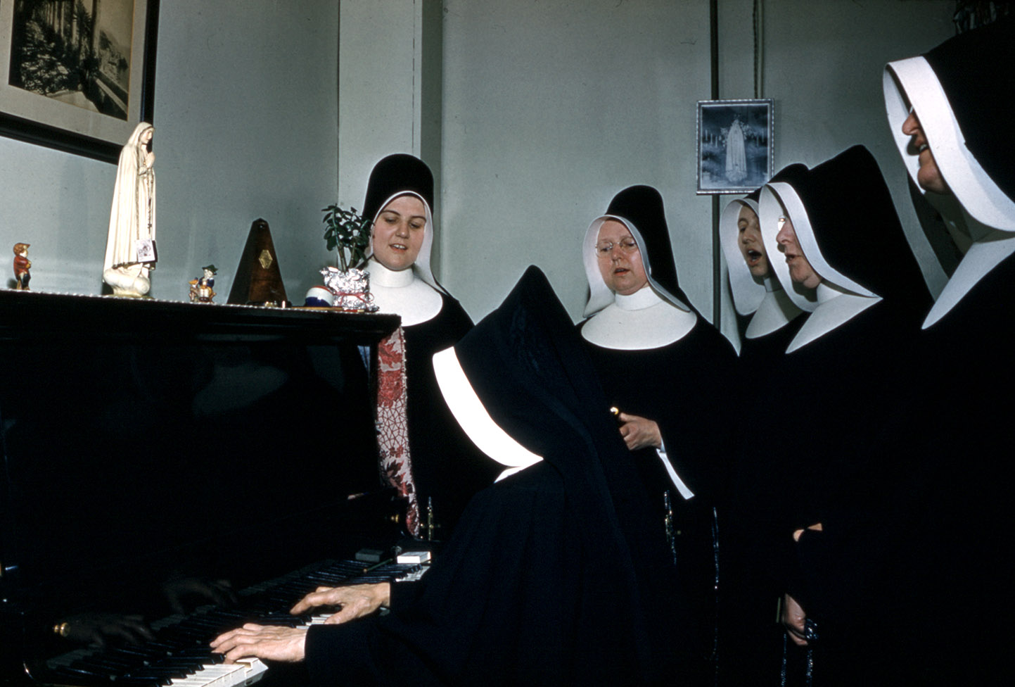 communityalbums - Sisters of Charity-Halifax singing around the piano, Mount Carmel Convent, New Waterford, Nova Scotia.