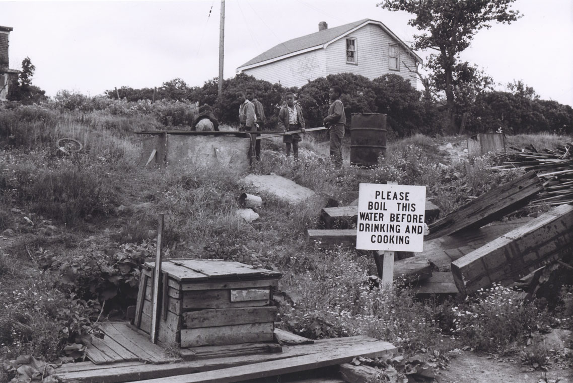 africville : Another of Africvilles wells with a sign reading, Please boil this water before drinking and cooking