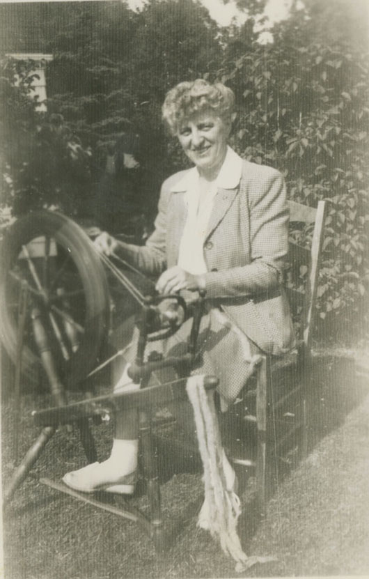 Mary E. Black with Spinning Wheel