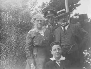 William and Agnes Dennis and two young men