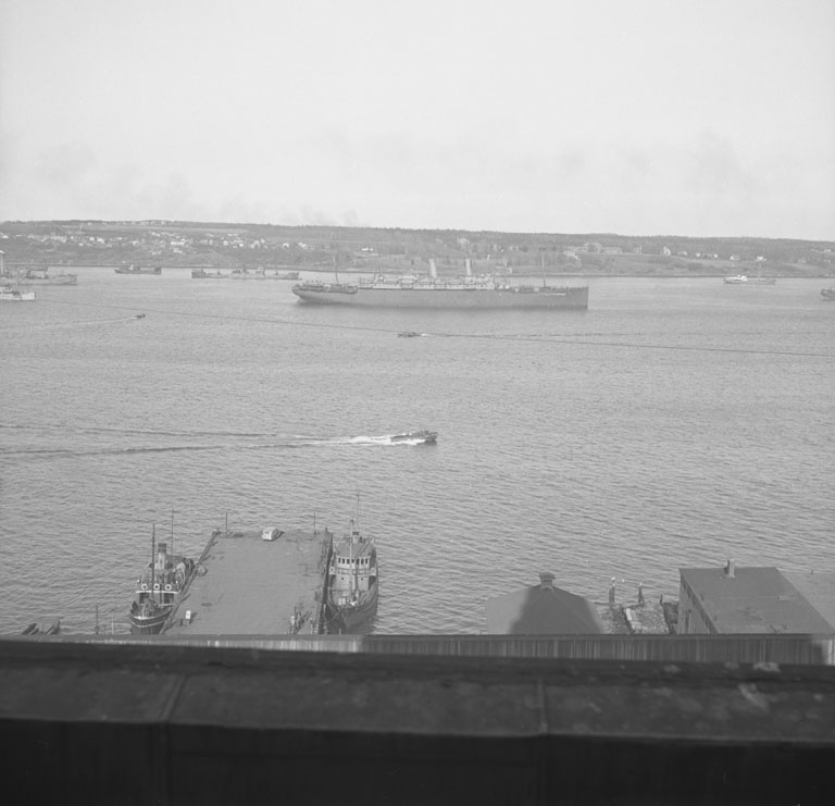 Possibly RCAF speedboat passing south, while liner SS <i>George Washington</i> is flying her signal letters