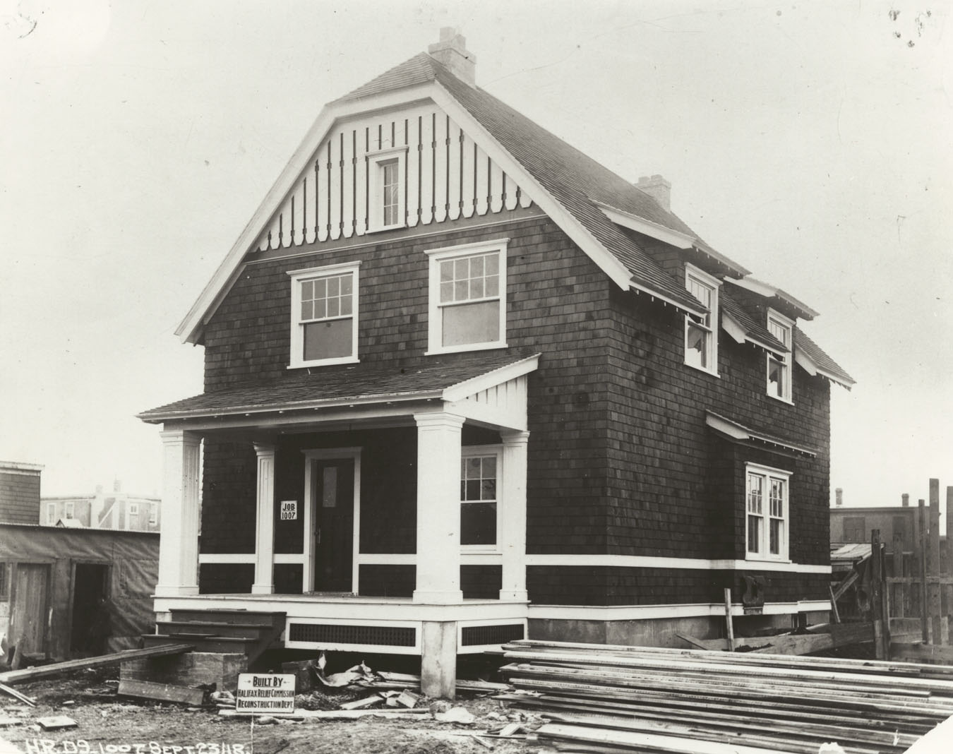 Original photograph copied through the courtesy of Mrs. Shirley Vaughan.       This wooden house, 7 (now 5661) Kane Street, was built for Norman Purcell.  The design was constructed in wood at several locations on Windmill Road, Dartmouth and in both wood and hydrostone on Livingstone and Duffus streets, Halifax.