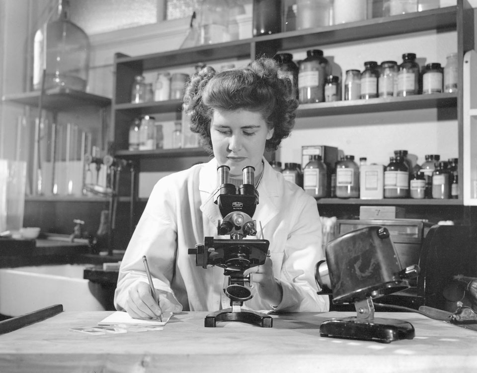 Woman Working with Microscope in Atlantic Fisheries Experimental Station, 209 Lower Water Street, Halifax, 21 January 1947