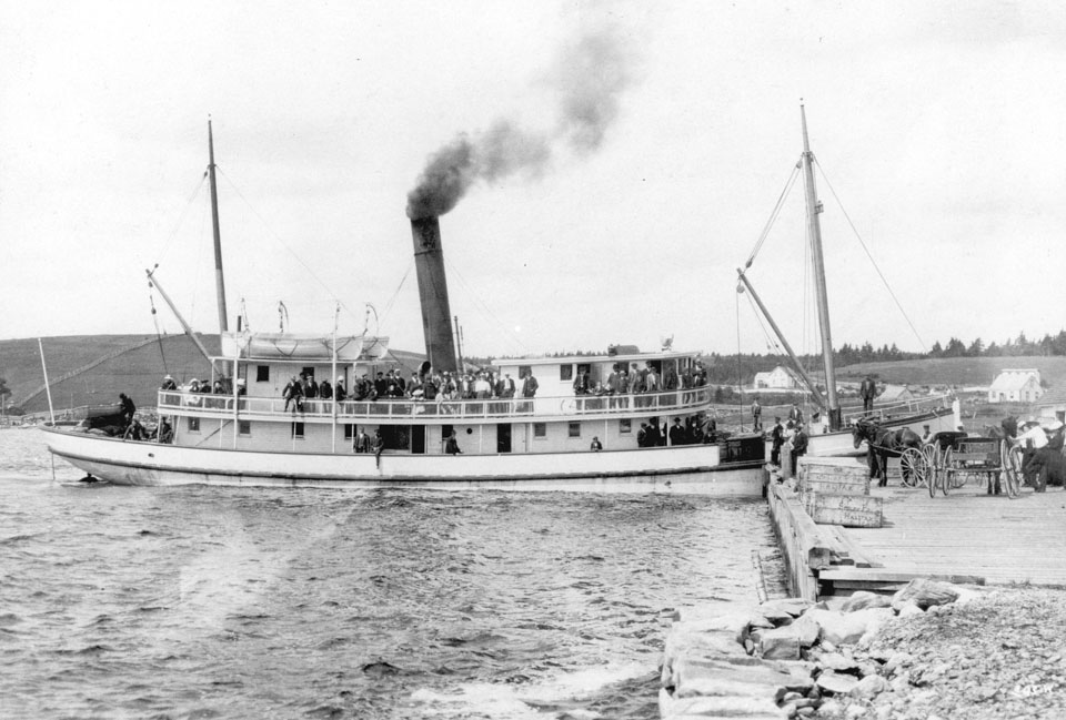 Steamer <i>Dufferin</i> at the Government Wharf, Port Dufferin, with Smiley & Company's Lobster Crates awaiting Transport to Halifax, ca. 1910