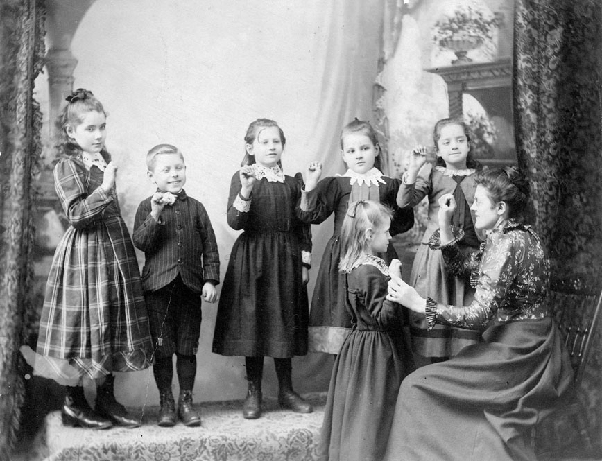 Students learning sign language, 1893