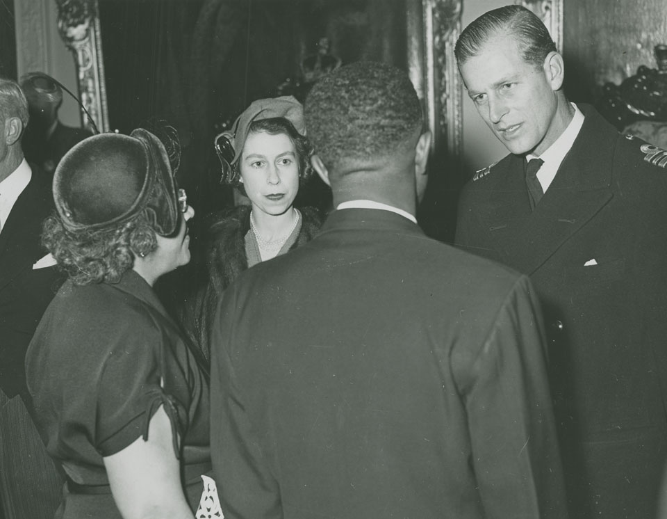 Mr. and Mrs. Charles Wilson are presented to Princess Elizabeth and the Duke of Edinburgh