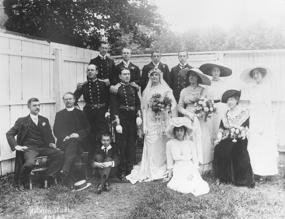 Lieutenant Thomas H Warde of the Naval College and Mrs. Warde (Mary Dorothy Lugan) and the Bridal party