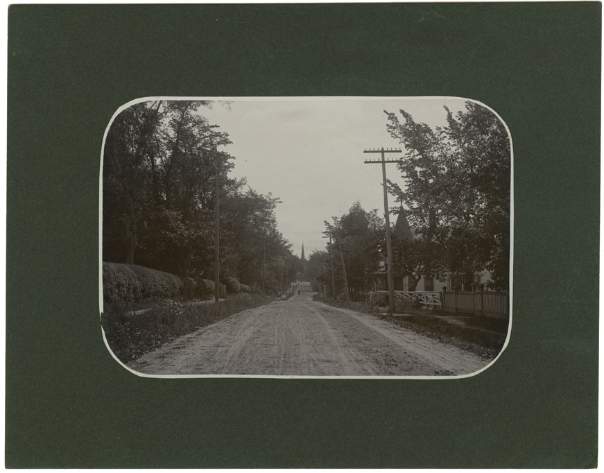 photocollection : Places: Bridgetown, Annapolis Co.: Streets: Granville St. looking East, hawthorne hedges on left on E. Ruggles and S. Ruggles grounds